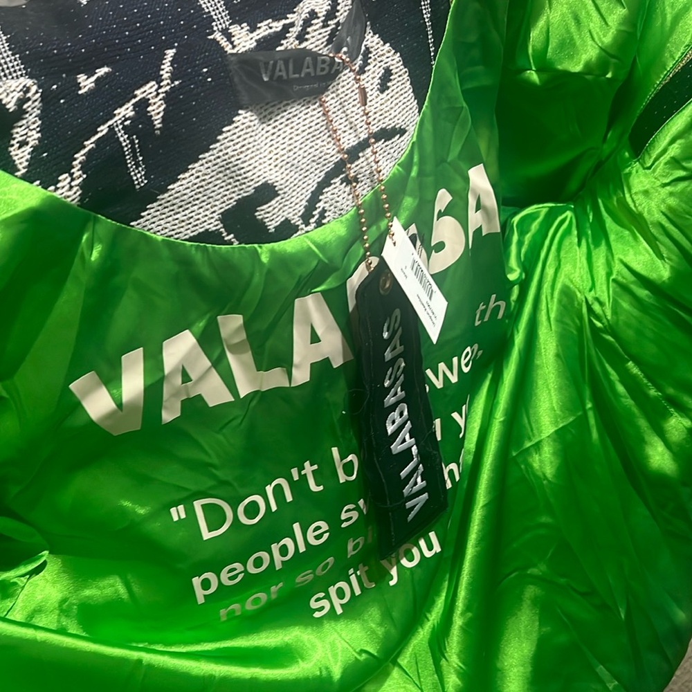 Valabasas unsung realities  jacket green and black mask